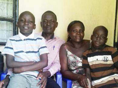 Ayub Omondi Awich with his wife Dorothy Achieng Omondi and sons Moses Adongo, John Terry